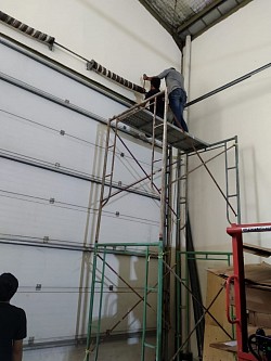 Service garage door taman tekno